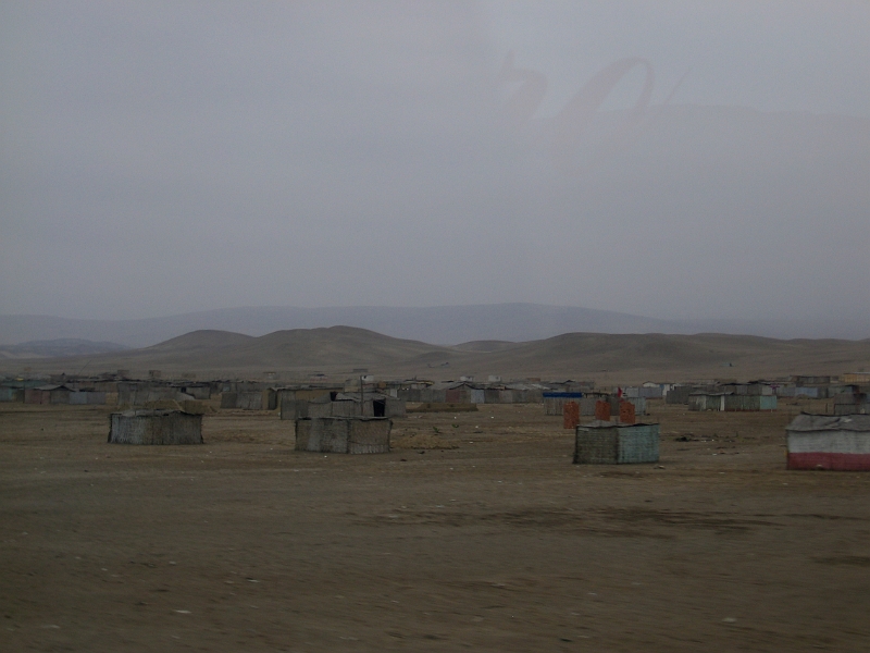 0806200007.JPG - Day 14, Friday, June 20. Enroute by bus from Nazca to Lima on the Pan Am Highway.